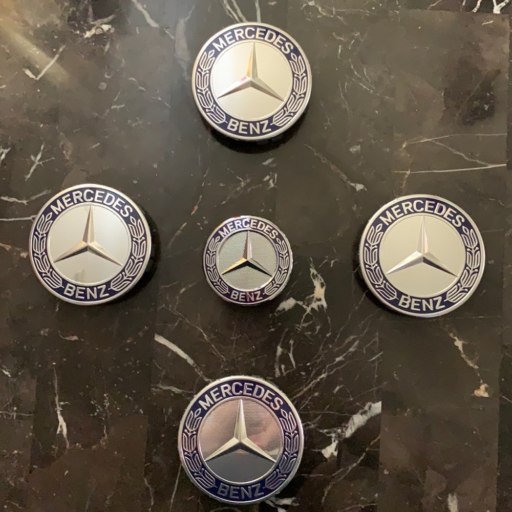 Authentic Mercedes Benz hood and wheel emblem
